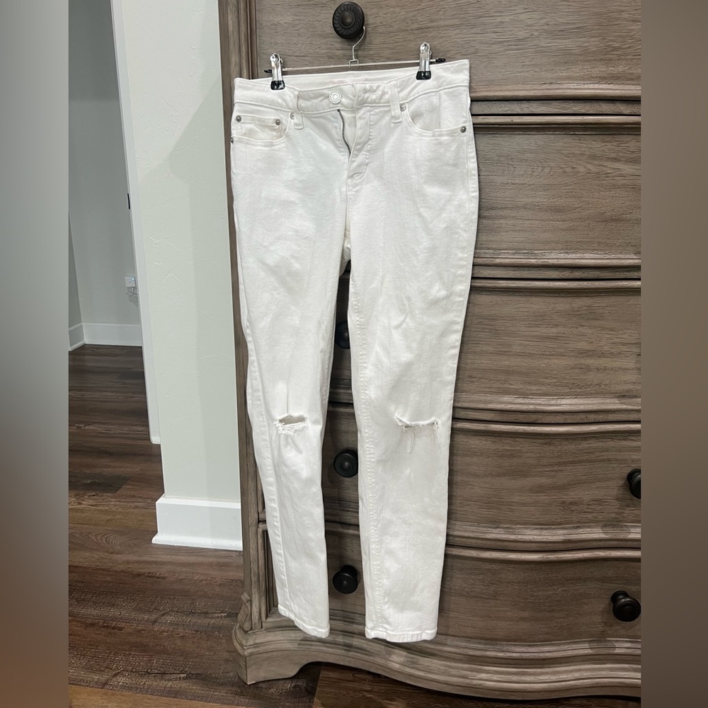 LC Lauren Conrad White Skinny Jeans with Distressed Knees